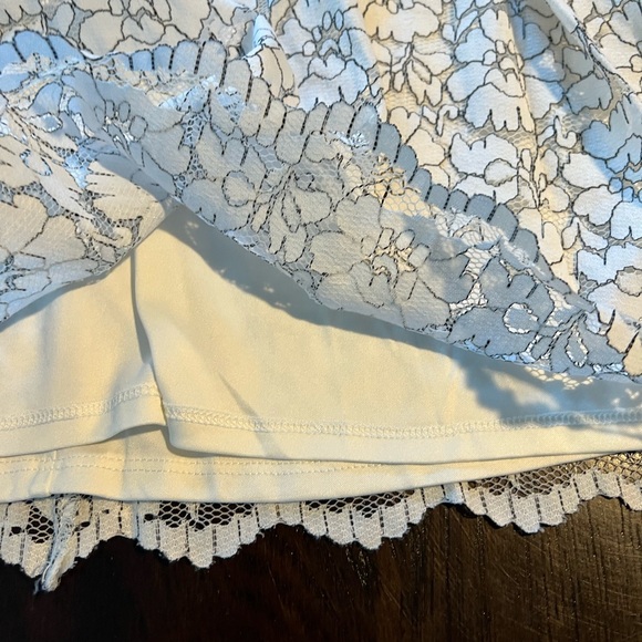 Torrid White with Black Stitching Floral Lacey Sleeveless Top - Picture 10 of 16